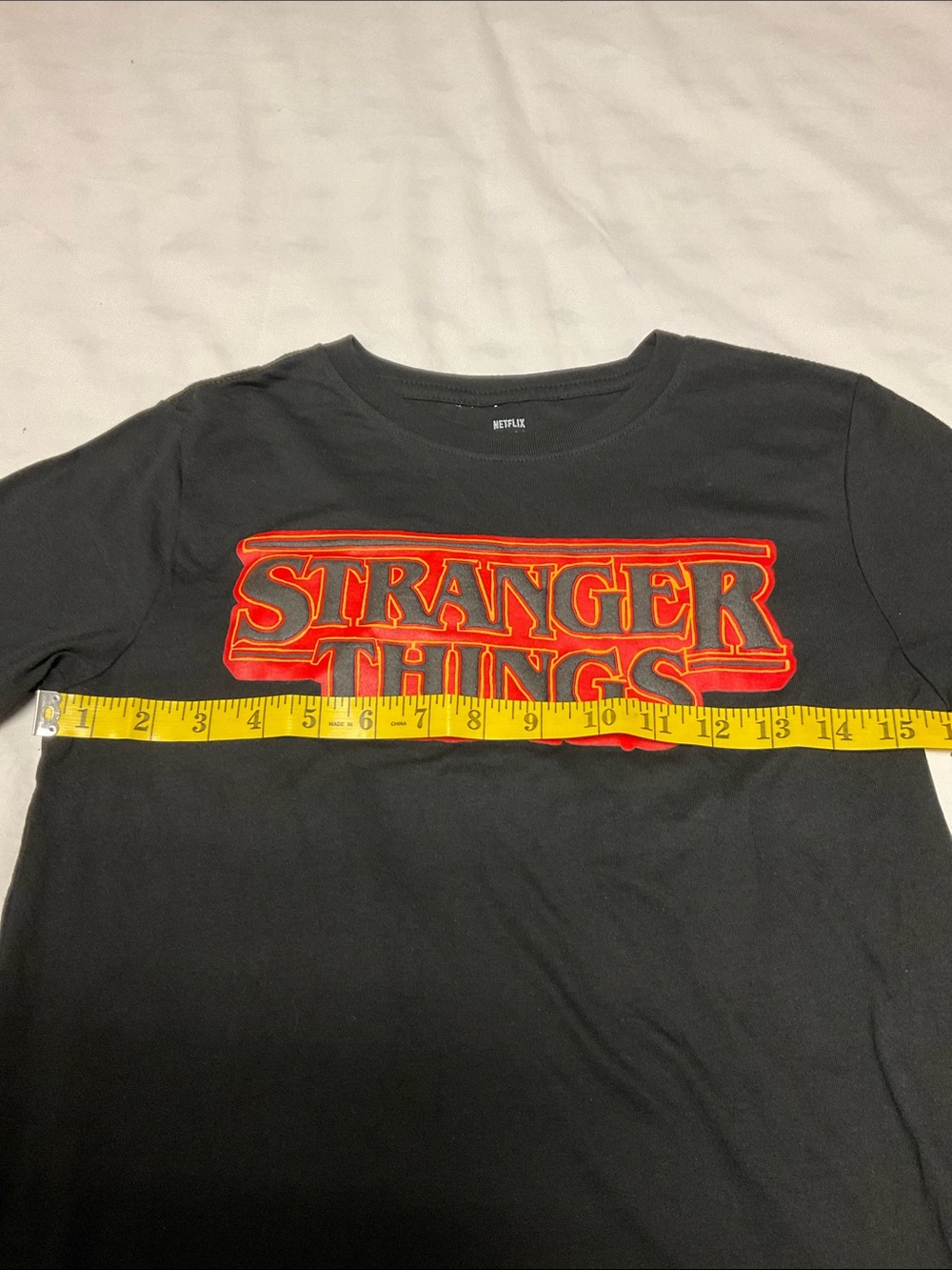 Boy’s Netflix Black Tee with Red and Orange Stranger Things Logo Size L 10/12 - Picture 3 of 5